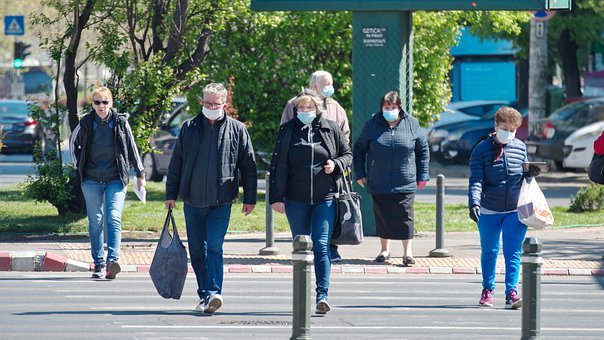 People walking in public with masks