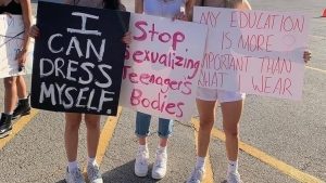 School dress code protest signs