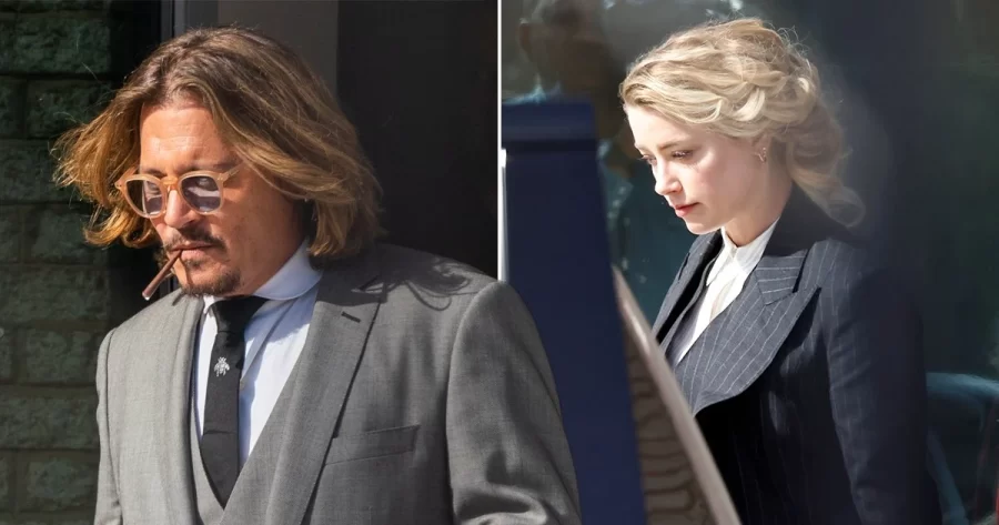 Johnny Depp & Amber heard walking out of court after day 1.