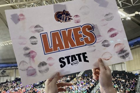 lakes sign at state, marked with kiss prints of lakes dancers
