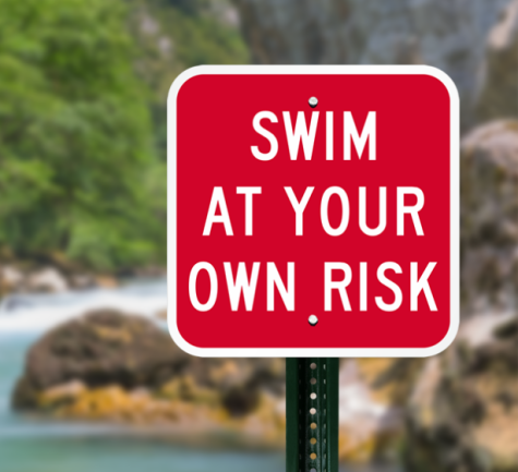 swim at your own risk sign